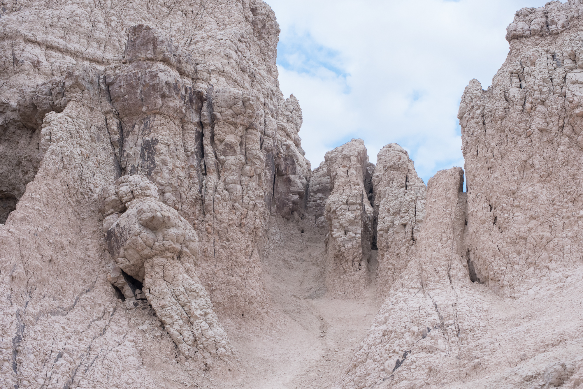 People shaped rock formations at Badlands National Park